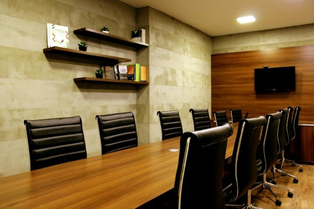 Neutral-toned conference room prepared for a professional mediation session